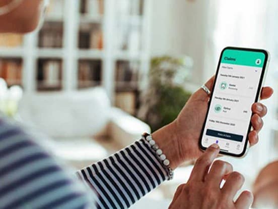 Woman using SImplyPlan app on smart phone