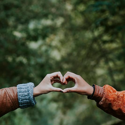 Two hands making a heart shape